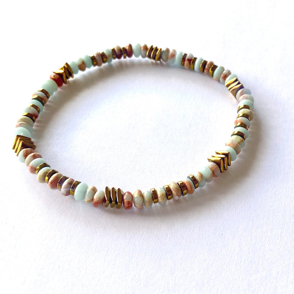 Bracelet élastique rondelle pierre naturelle peau de serpent et hématite