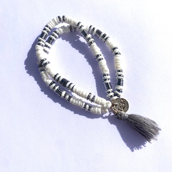 Double bracelet Coquillage hématite argent et pompon gris