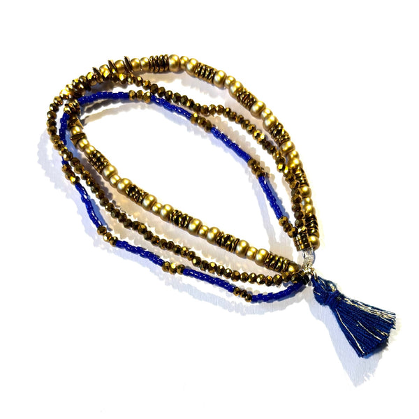 Bracelet pompon marine et doré