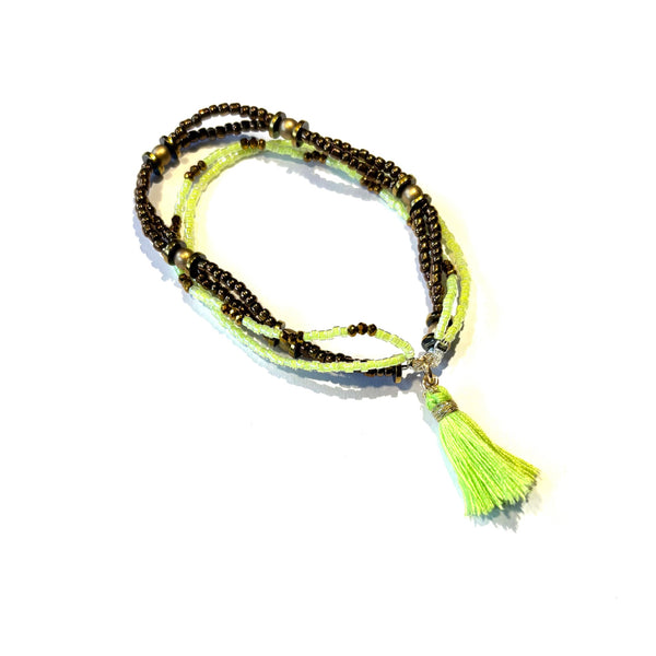 Bracelet pompon jaune fluo