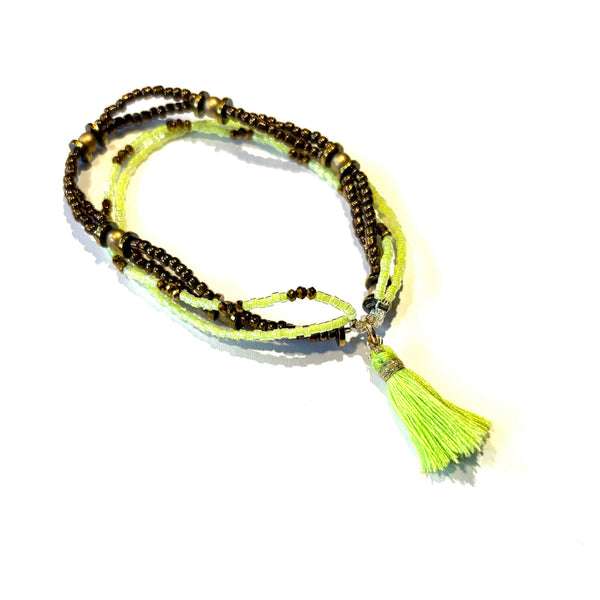 Bracelet pompon jaune fluo